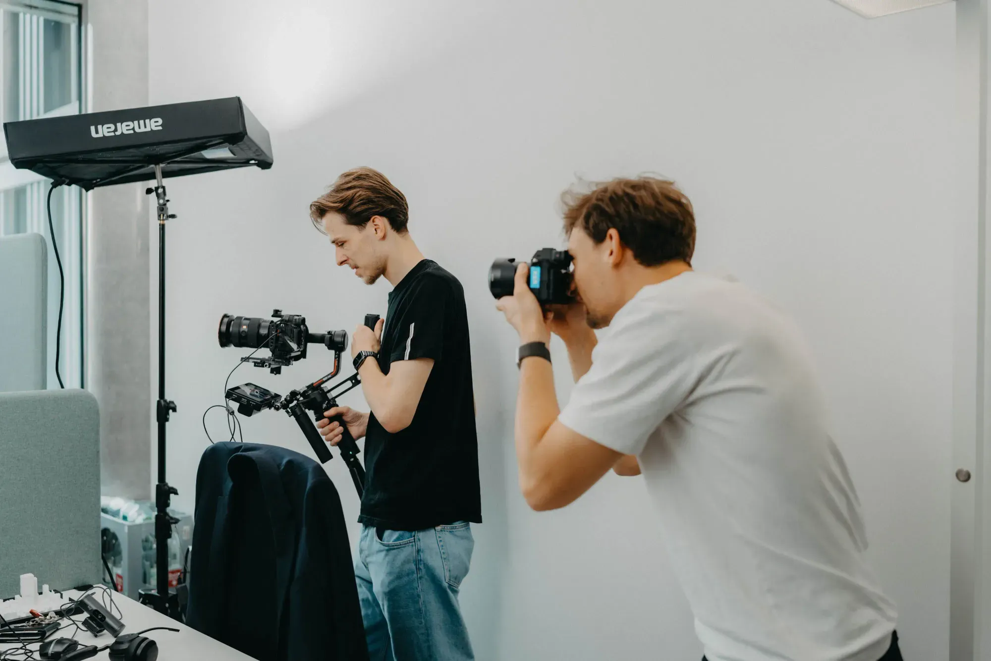 VAP behind the scenes: camera team filming portraits in the meeting room
