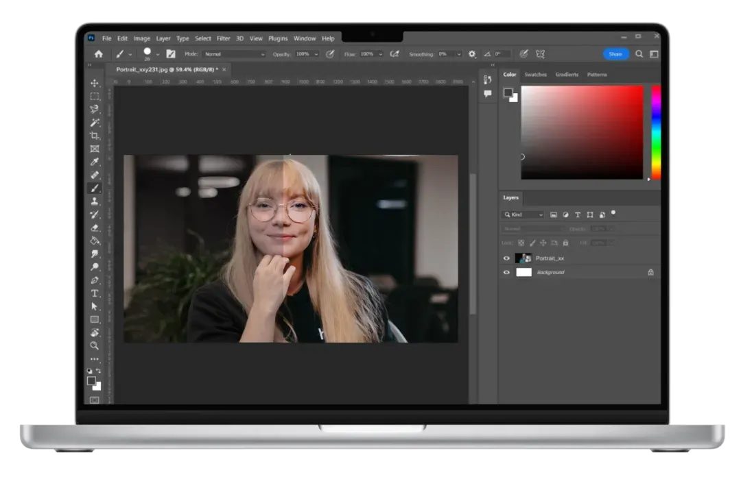 Photo editing on a laptop: color and exposure correction of a portrait photo