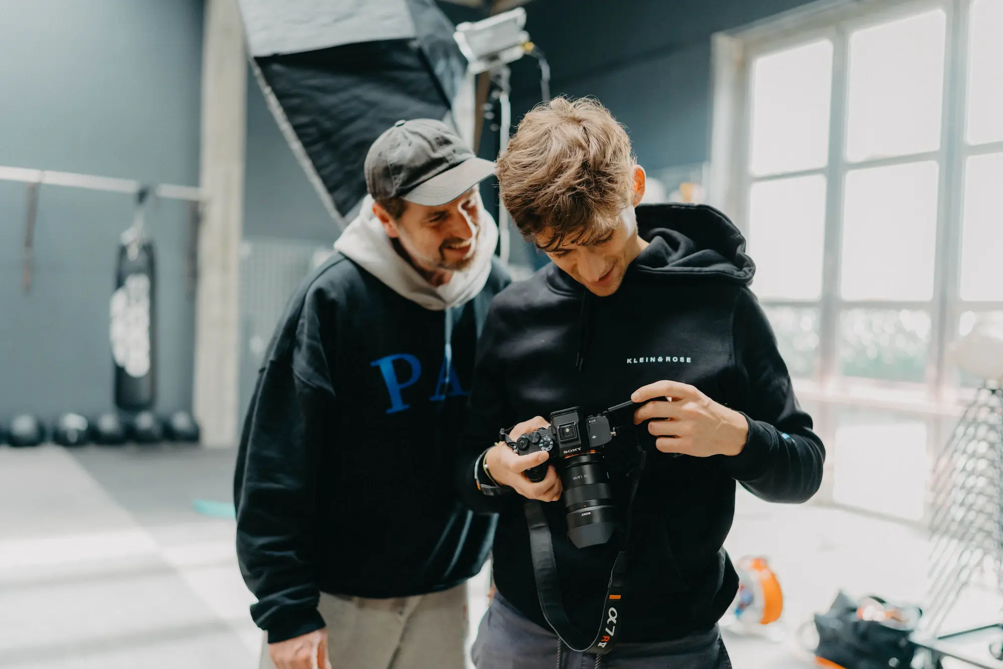 Photographer and client reviewing the photos taken